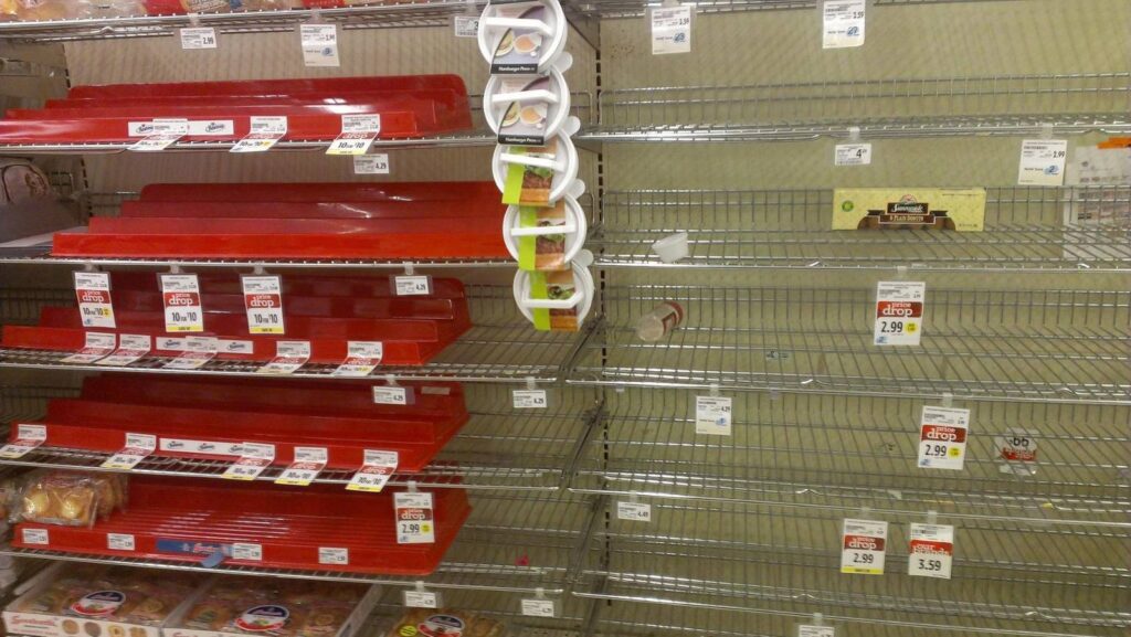 Home goods store empty shelves showing declining economic conditions