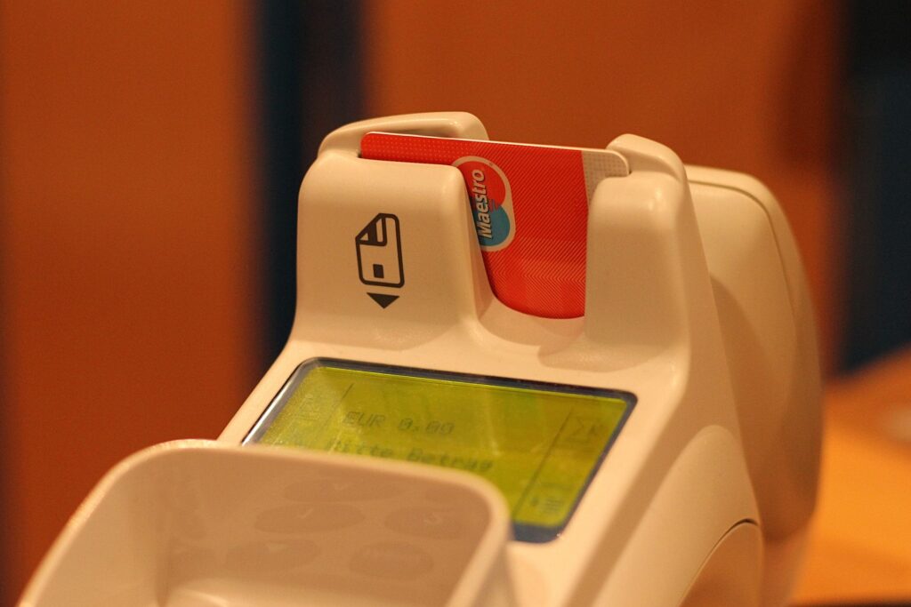 Credit card in white POS system payment